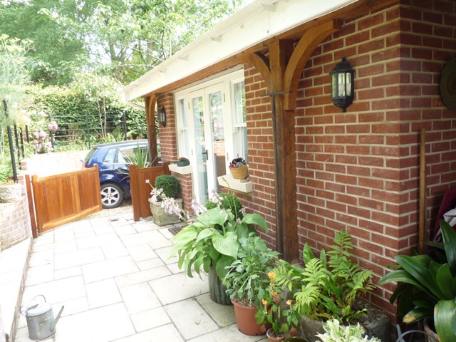Single storey wraparound extension incorporating vaulted ceilings with roof windows.